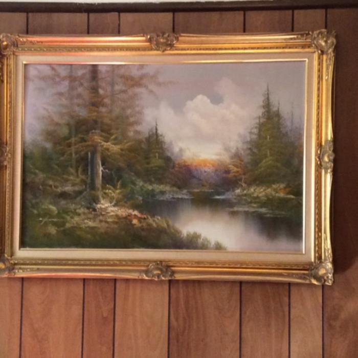 Nature scene painting in frame.