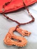Unusual Pendant of carved Ivory on silk cord with Jade beads and rings