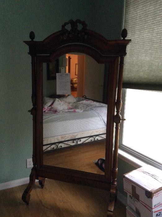 Henry II style full length walnut mirror circa 1880. Mirror swivels and tilts on special frame. Extremely rare