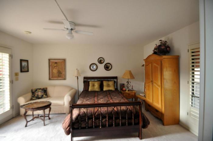 COFFEE TABLE AND PICTURE ABOVE LOVESEAT NOT PART OF SALE