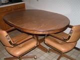 Vintage kitchen table and two chairs in rough shape