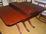 Drop leaf dinning table with three leaves and four chairs