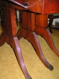 Drop leaf dinning table with three leaves and four chairs