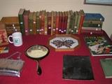 Old books, antique powder mirror