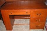 Wood desk with hidden compartment