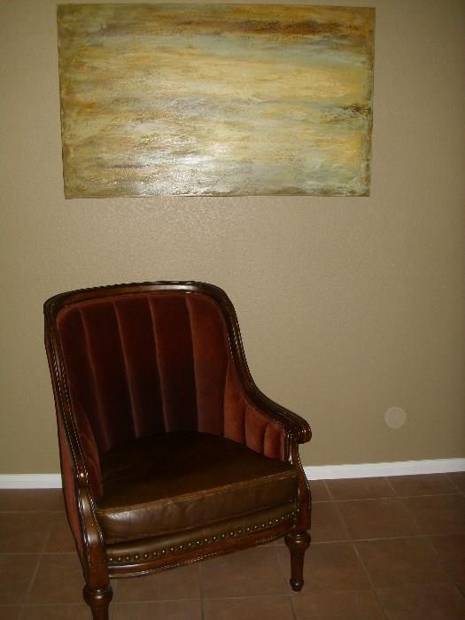upholstered/leather comfy chair, abstract art,