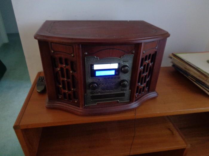 Turntable, radio & tape player - also converts LPs and tapes to CDs