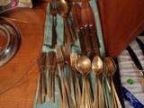 Mid-Century Dirilyte bronze flatware -- 52 pieces