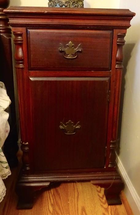 Solid mahogany Hungerford company (Memphis, TN) one of two end tables matching colonial high poster queen bed. Both end tables have drawers and cabinet storage.  Good condition.