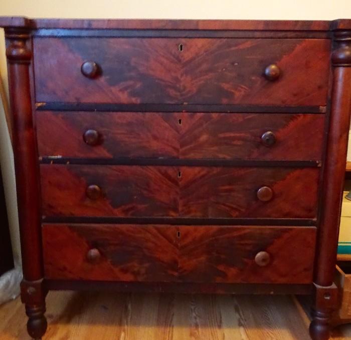 Beautiful walnut four drawer chest on castors. 