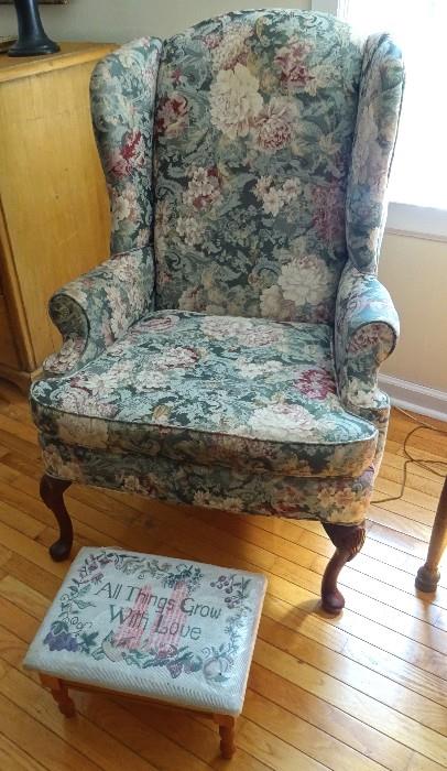 Beautiful floral wingback chair. A perfect item to sit in any room and paired with a sewing foot stool that says All Things Grow With Love.  