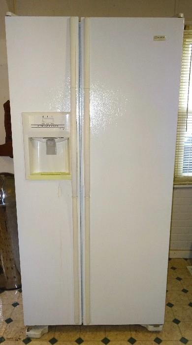 Maytag Performa double sided refrigerator with ice maker. Both freezer and refrigerator are clean and in working condition. Model Number PSD2450GRW Serial Number 13433626ZY