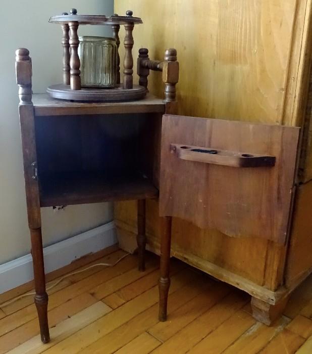 Vintage smoking cabinet with a pipe holder on interior door. Would also make a great side table or small nightstand.