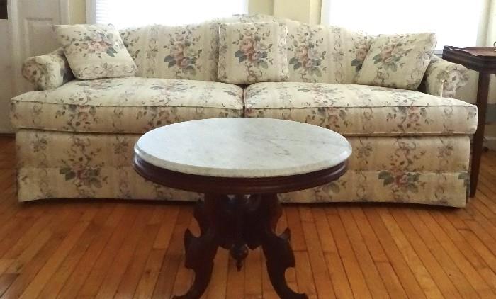 Full size sofa with rolling arms and matching three pillows.  Like new and very comforable.  Sold separately or with matching love seat.  Solid rosewood Victorian Reaissance oval marble top coffee table.
