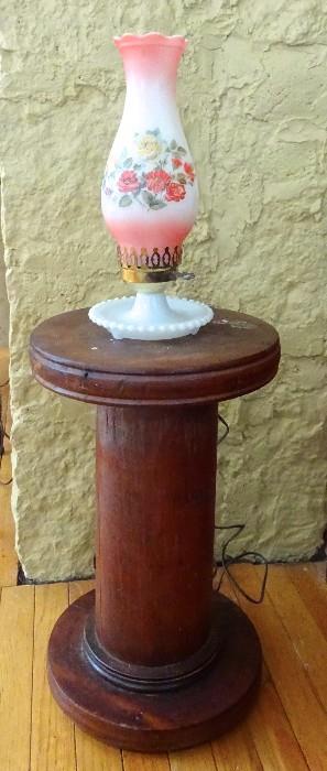 Primitive Spool table with milk glass lamp.  A great size for a room that needs a small side table or lamp table.  Very unique.  Solid wood.