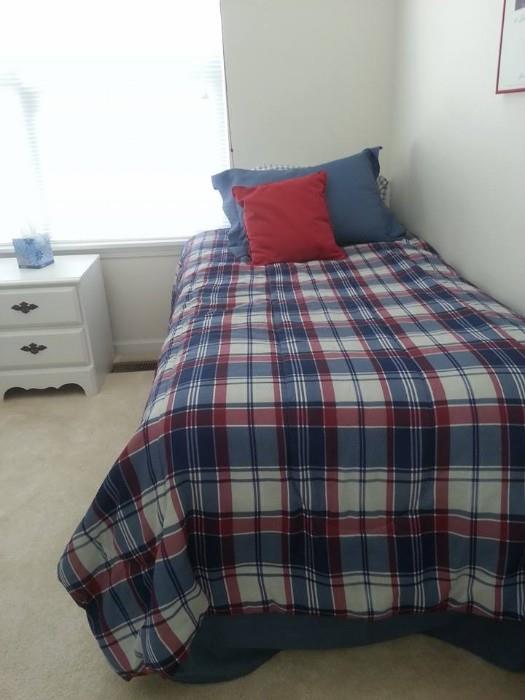 Two twin size beds, bedding. Can buy just the mattresses or just the bedding or...