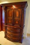 Two piece Hutch- armoire and dresser with central Light,can be disassembled with tools. T V Ready $300.