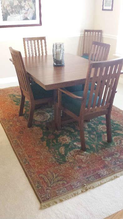 Hand loomed oriental carpet and fabulous mission table that matches dining hutch