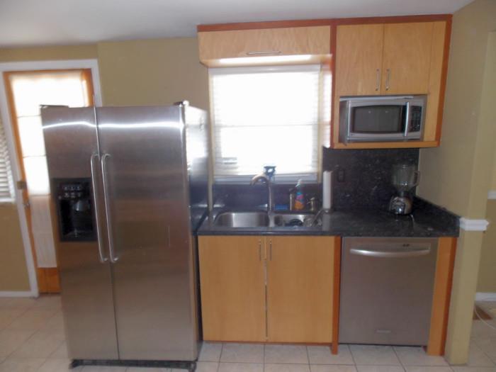 Newer Stainless Steel Refrigerator , Newer Stainless Steel Stove , Newer KitchenAid Stainless Steel Newer Maple Kitchen With Granite Counter Tops 