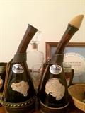 Vintage Dickel bottles, one with wooden stopper, both with leather handles