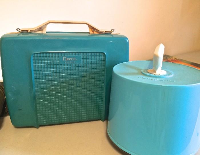 Amazing turquoise portable child's record player and a matching case full of 45s