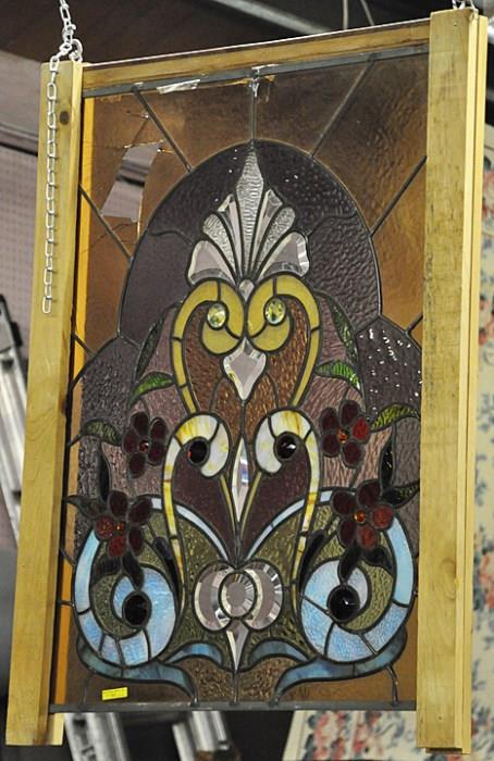 ORNATE STAINED / JEWELLED / BEVELLED GLASS WINDOW. AS IS - GLASS MISSING. MEASURES 37" HIGH BY 26" WIDE.