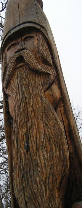 Folk art carving of seven foot gnome 