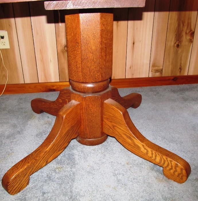 View of the Pedestal Base for Vintage Oak Dining Table with beautiful natural oak finish,  Pedestal Base,  3 Extra Leaves.  
