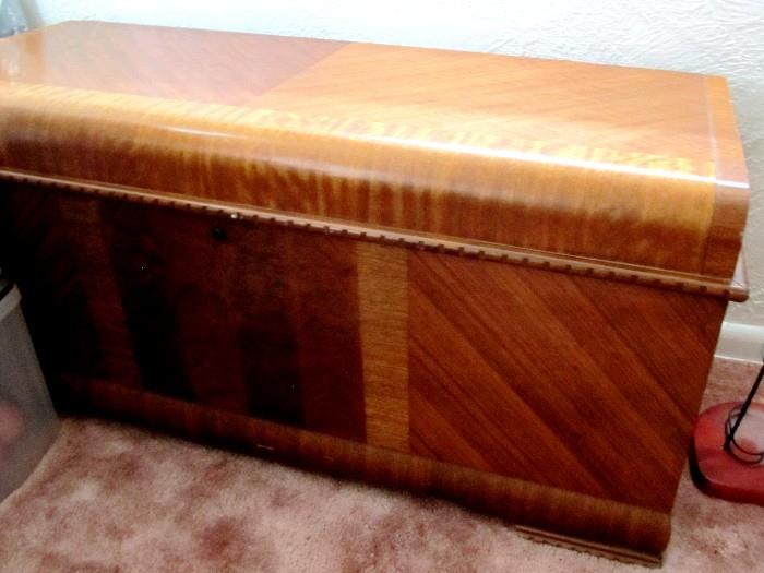 Vintage Lane Cedar Chest...waterfall design with lovely inlaid accents and rich color, has large interior top storage tray.  Great accent piece.