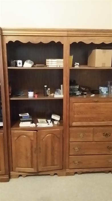 One of two oak cabinets