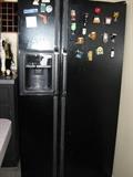 KENMORE side by side refrigerator/freezer