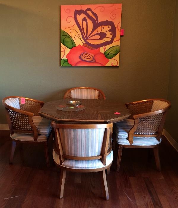 Four pub chairs, game table, and art!