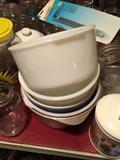 BEFORE PHOTOS:A mixing bowl for every type of old mixer has been found here....