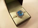 From Ross Simons jewelers - 18.5 carat blue topaz and diamond ring in 14kt white gold - size 8.  Fantasy cut stone - it's a STUNNER!