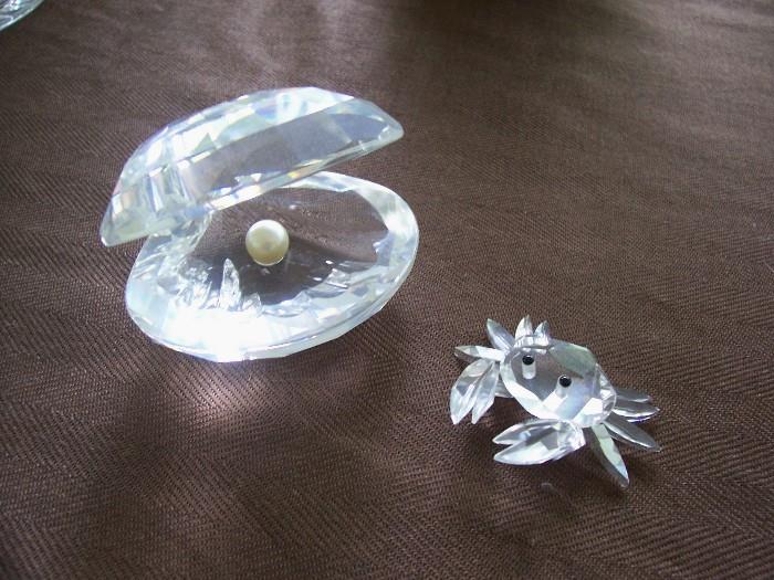 A couple of pieces of Swarovski crystal, with boxes...