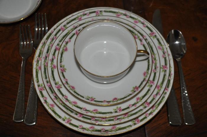 Complete five piece place setting of the Limoges' china