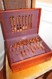 Clover Hill gold-plated flatware in chest
