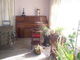 Nice upright piano.  The hand painted vase is large and the pictured Lladro is unusual.