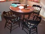 This Antique table and 4 chairs is sturdy and in excellent condition.