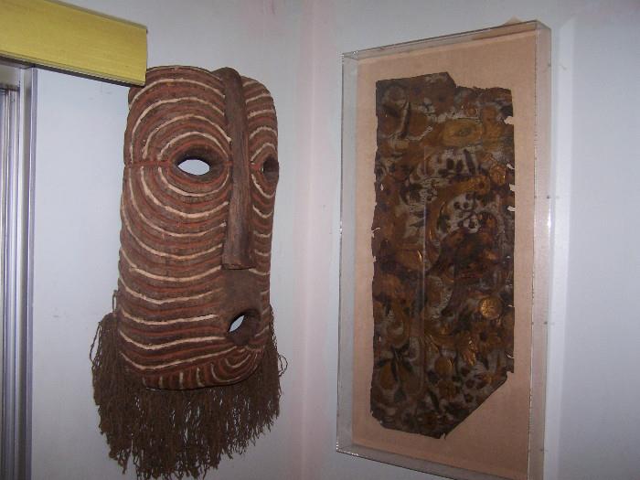 16TH CENTURY POLISH CASTLE LEATHER WALLPAPER FRAGMENT; CARVED MASK FROM NEW GUINEA