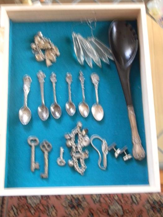 Vintage skeleton keys, collector teaspoons and charm bracelets