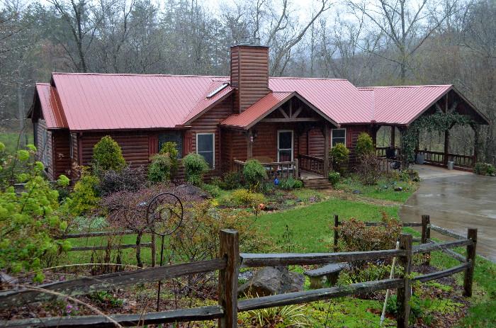 Beautiful log home on 8 acres with out buildings is for sale by realtor. 