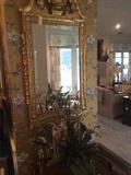              One of several exquisite gold mirrors