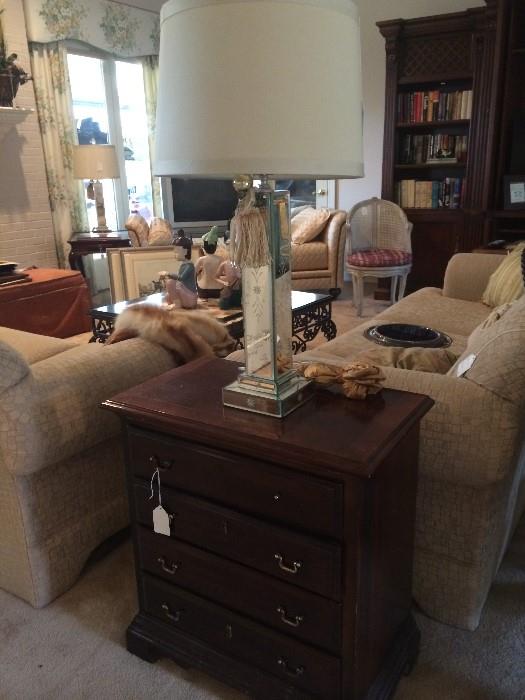 One of two matching 4-drawer end tables/night stands; mirrored lamp