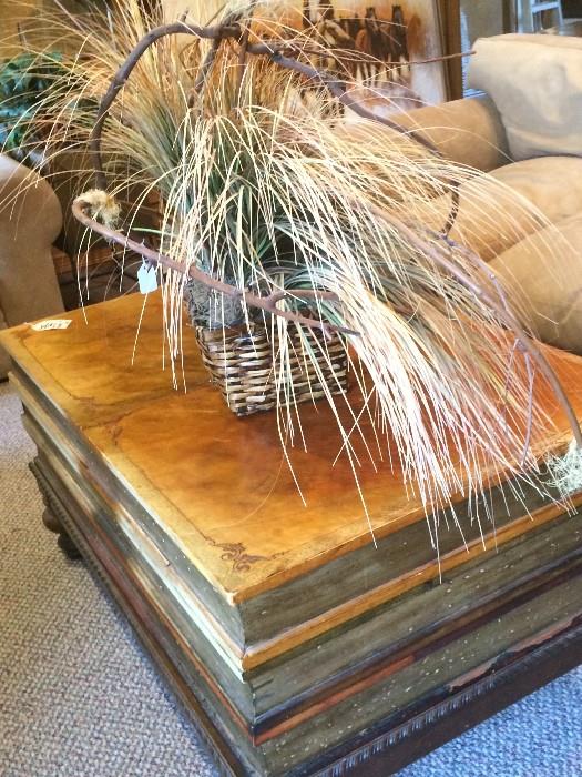   "Stack of books" coffee table; wild grass arrangement