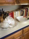      Fish tureen; carving knives; some of the many cookbooks