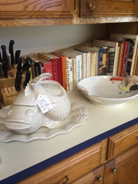      Fish tureen; carving knives; some of the many cookbooks