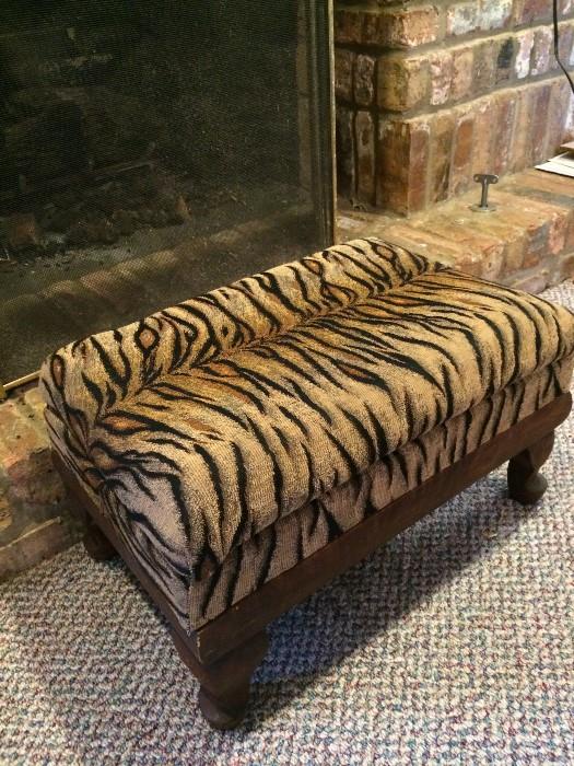               Tiger fabric upholstered ottoman
