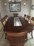 Formal dining room table with 8 chairs. Good condition. 