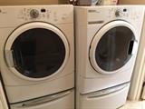 Maytag front loader washer and dryer with pedestals. Excellent condition. 